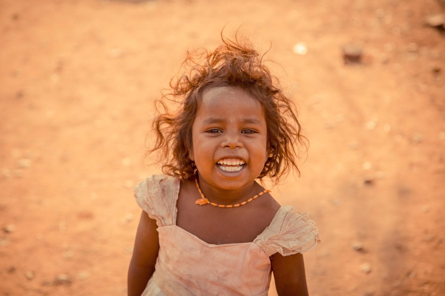 Smiling child supported by ZAHA NGO in Madagascar